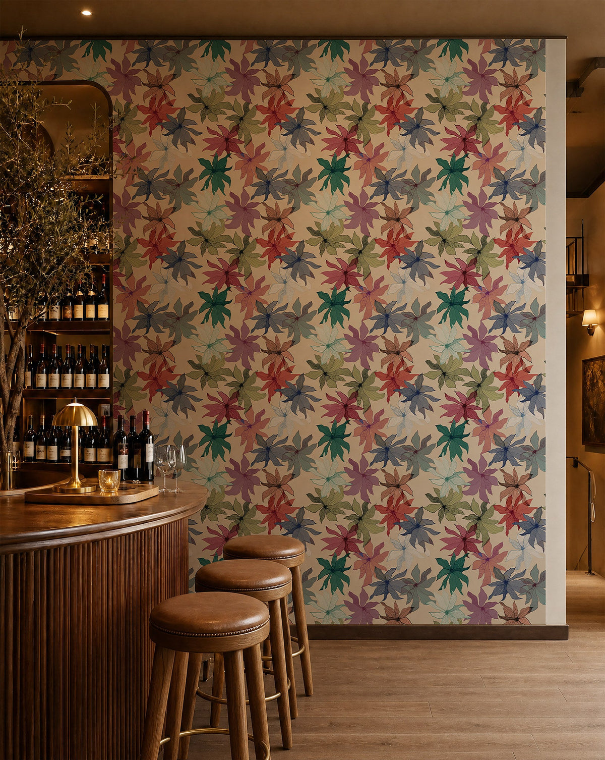Multicolor floral on cream wallpaper installed behind a wine bar