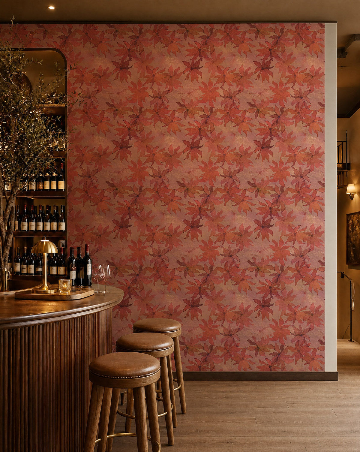 Coral and pink watercolor floral wallpaper installed behind a wine bar