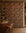 Gray-blue floral on orange commercial wallcovering installed behind a wine bar