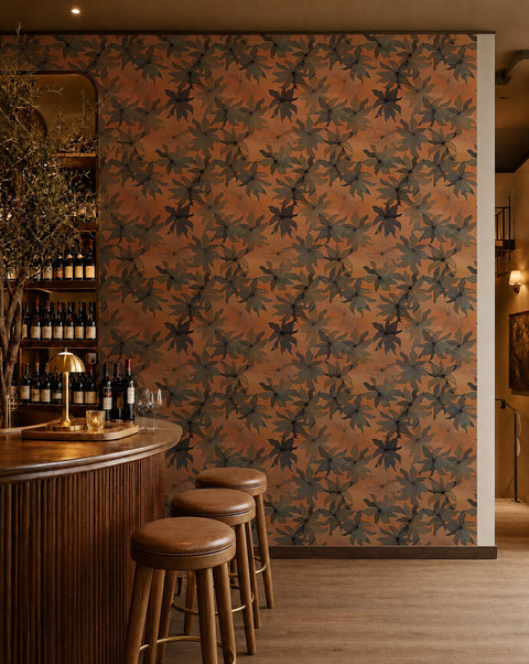 Gray-blue floral on orange commercial wallcovering installed behind a wine bar