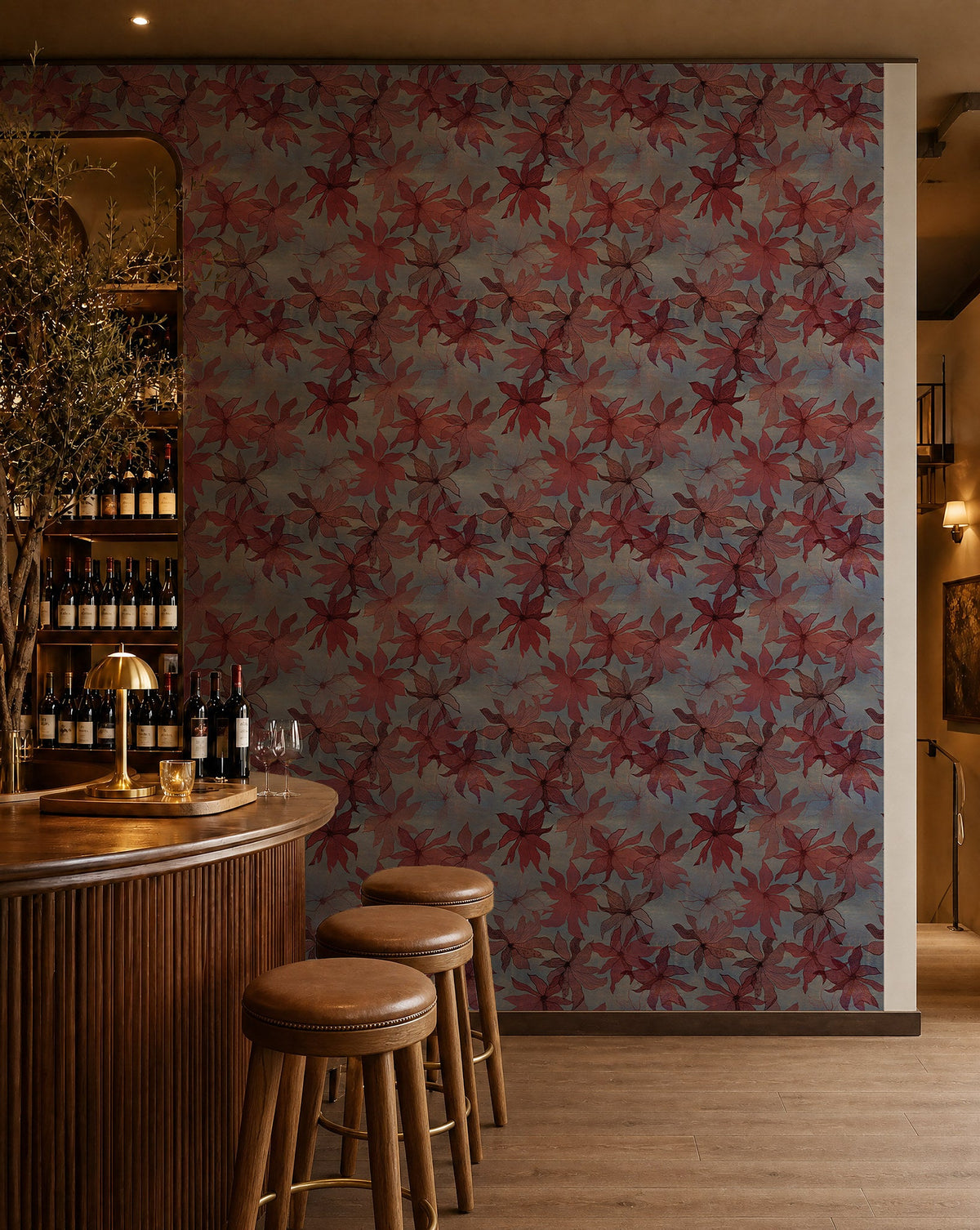 Red floral on dusty blue commercial wallcovering installed behind a wine bar