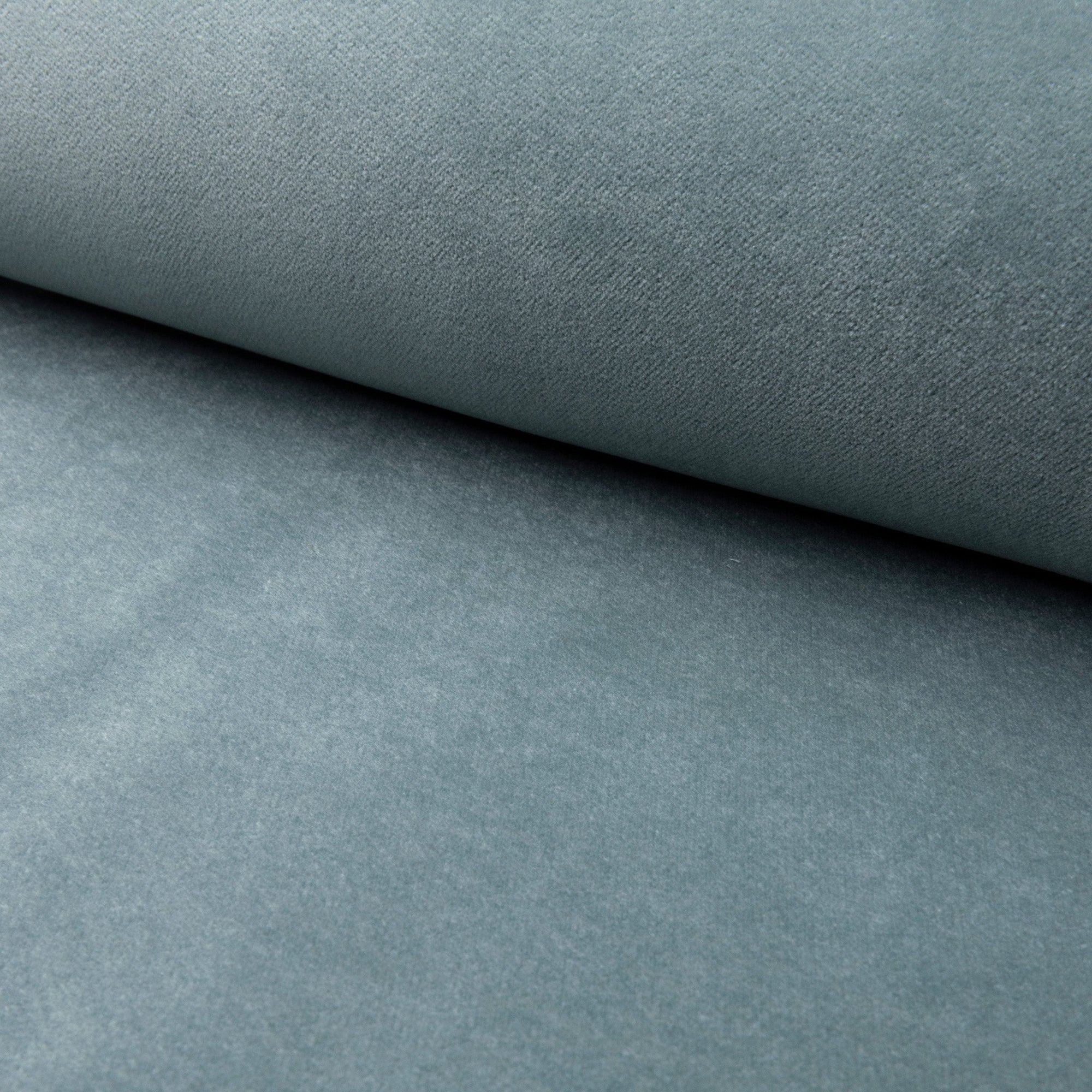 Green velveteen upholstery fabric by the yard, rolled bolt view