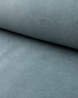 Green velveteen upholstery fabric by the yard, rolled bolt view