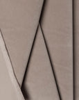 Gray velveteen upholstery fabric by the yard, folded showing drape and weight