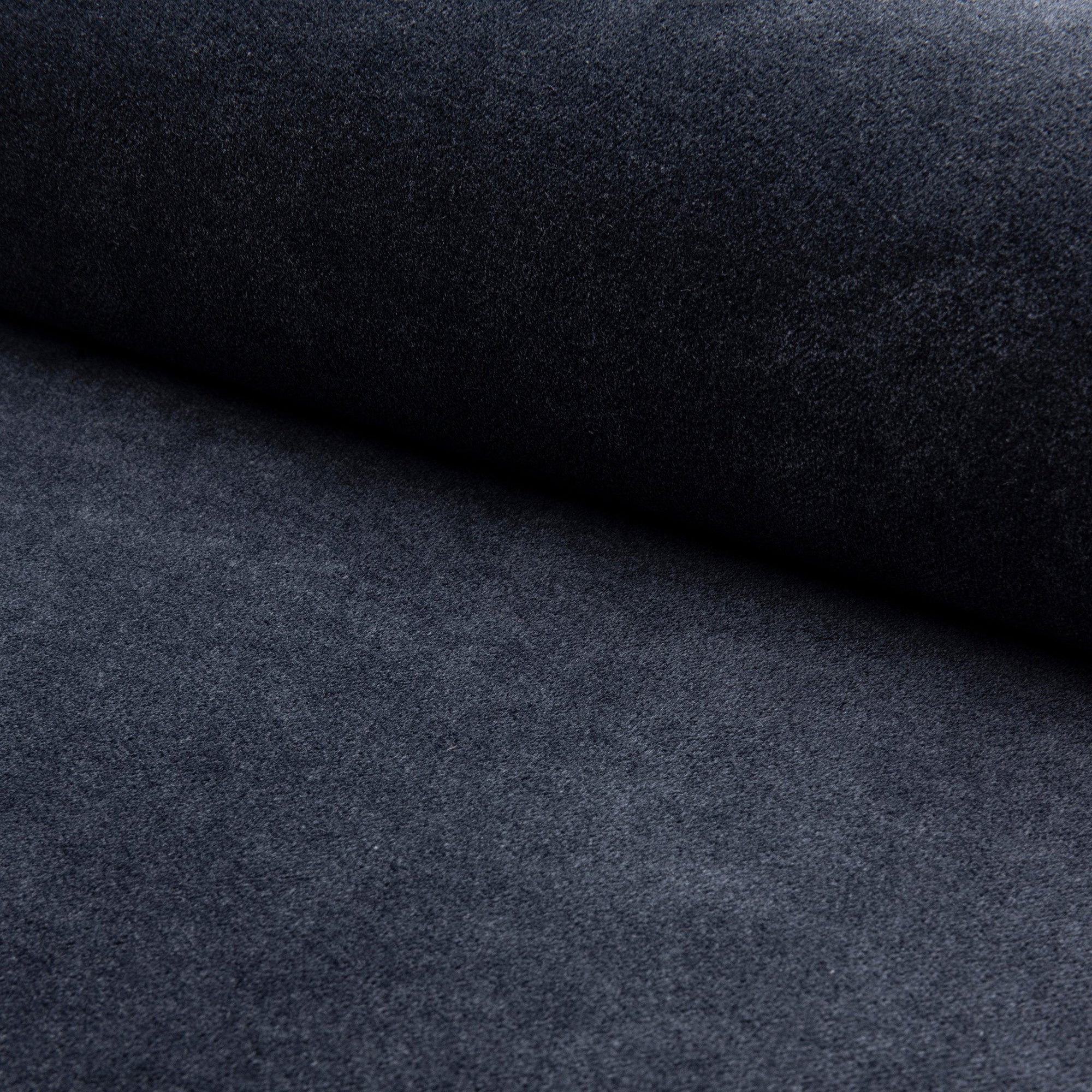 Black velveteen upholstery fabric by the yard, rolled bolt view