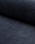 Black velveteen upholstery fabric by the yard, rolled bolt view