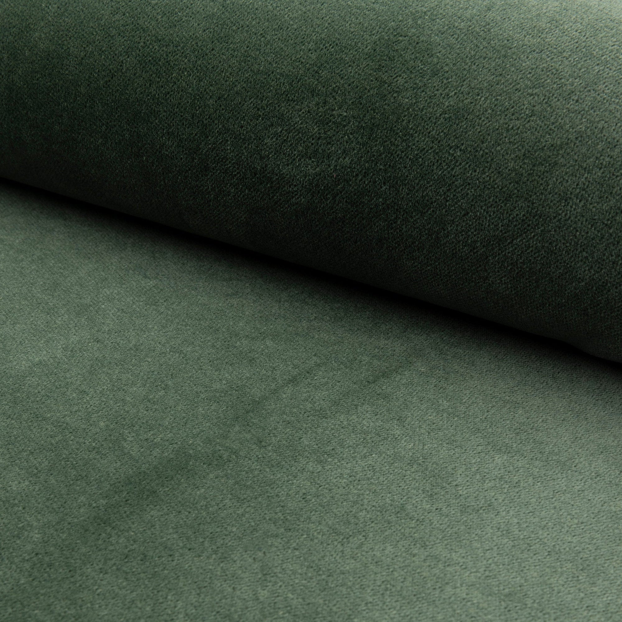 Forest green velveteen upholstery fabric by the yard, rolled bolt view