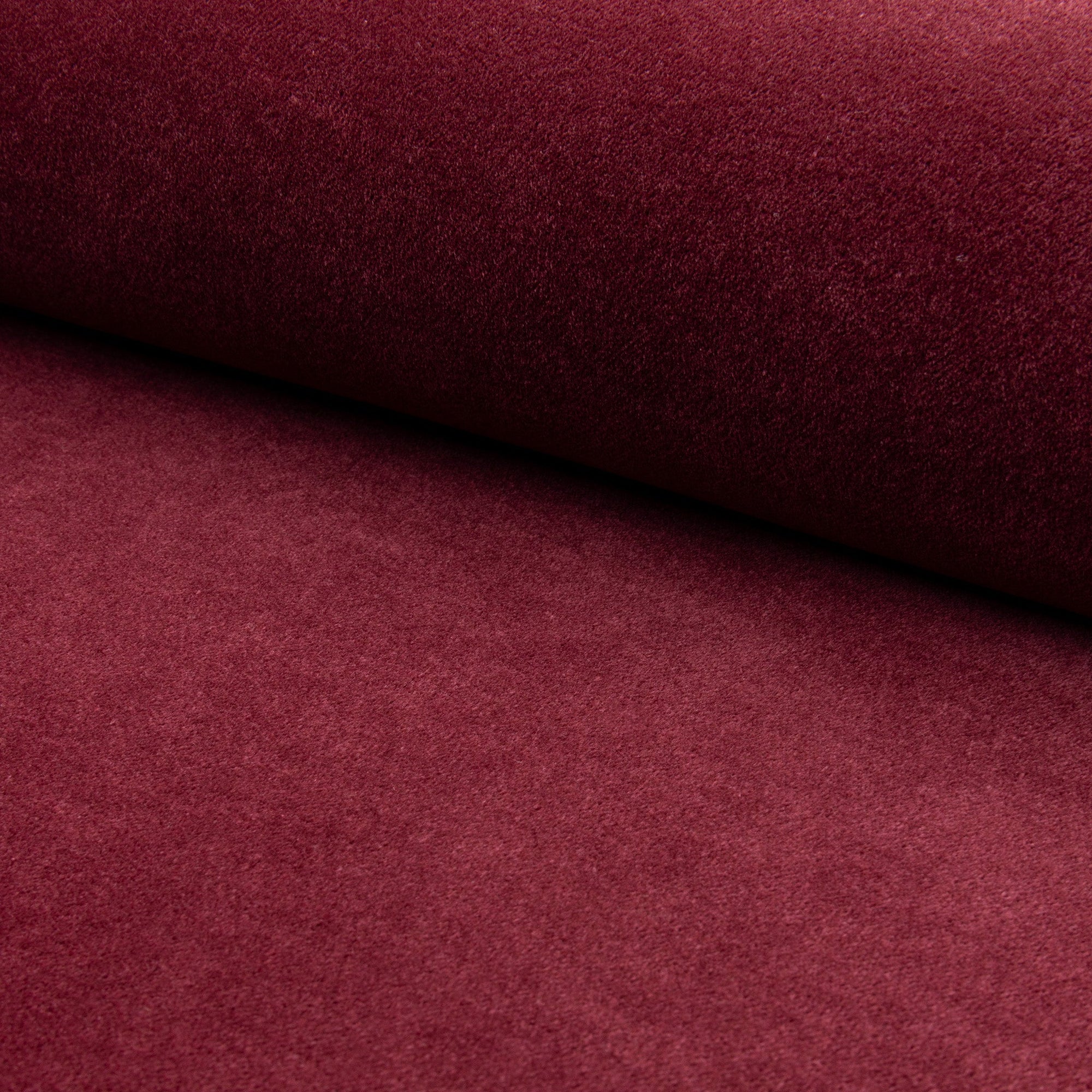 Burgundy velveteen upholstery fabric by the yard, rolled bolt view