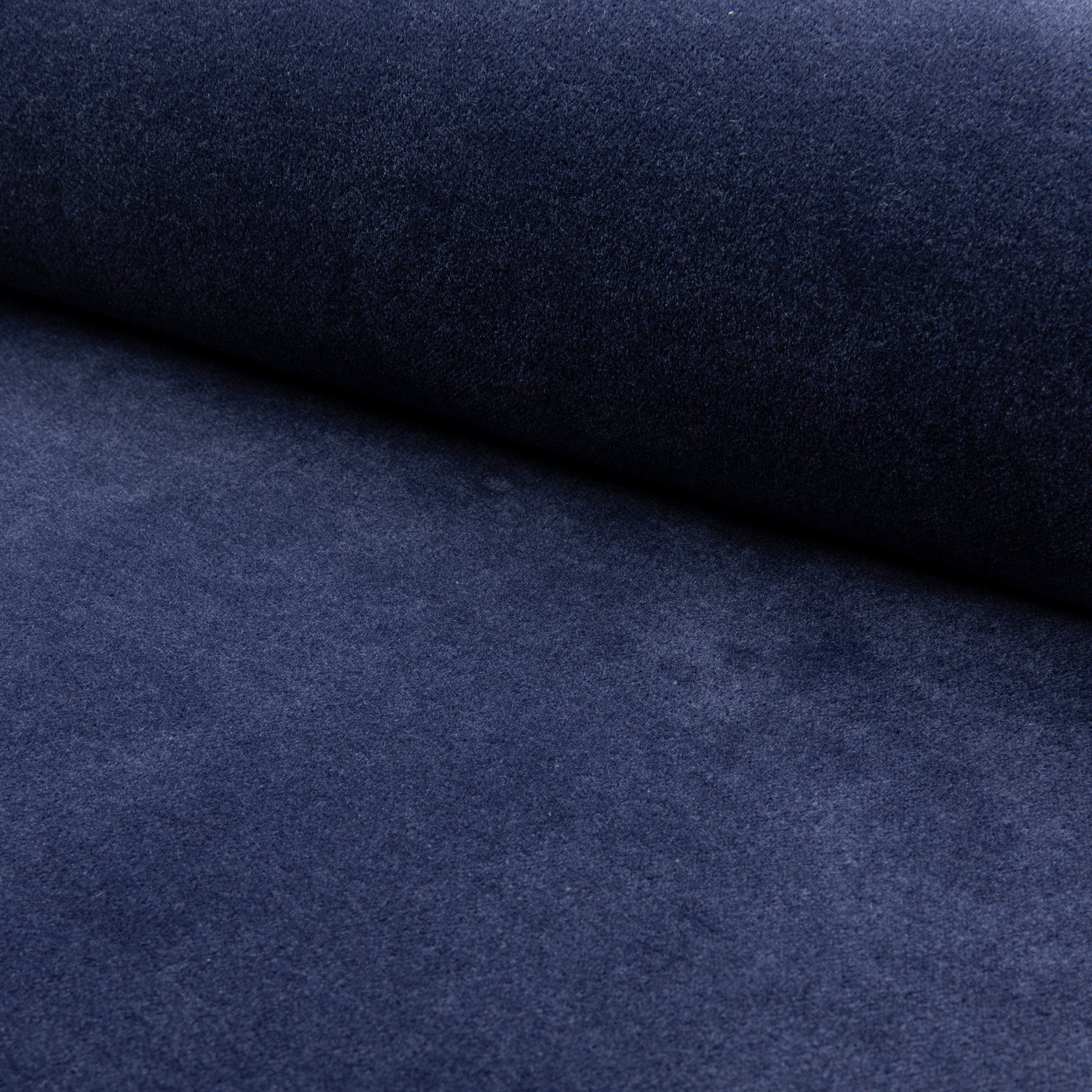 Navy velveteen upholstery fabric by the yard, rolled bolt view