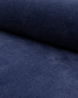 Navy velveteen upholstery fabric by the yard, rolled bolt view