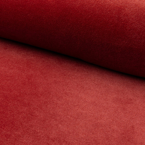 Red velveteen upholstery fabric by the yard, rolled bolt view