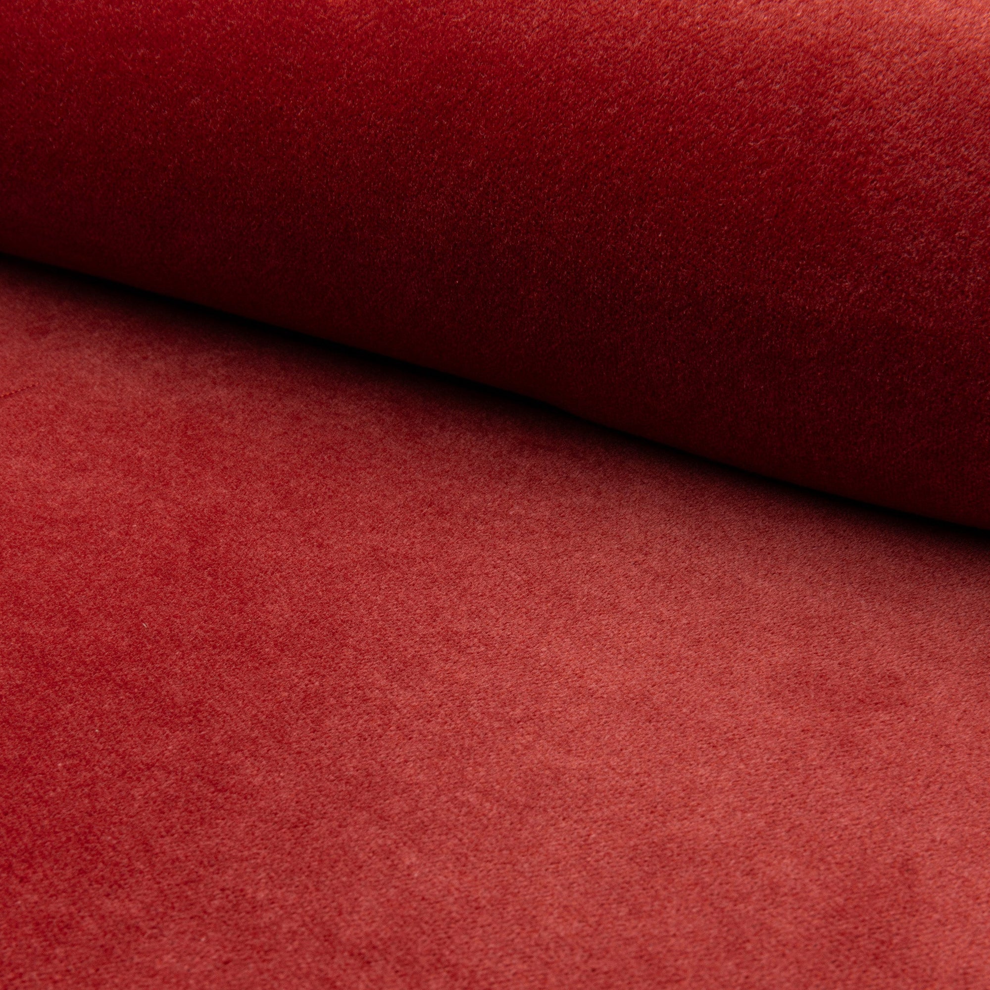 Red velveteen upholstery fabric by the yard, rolled bolt view