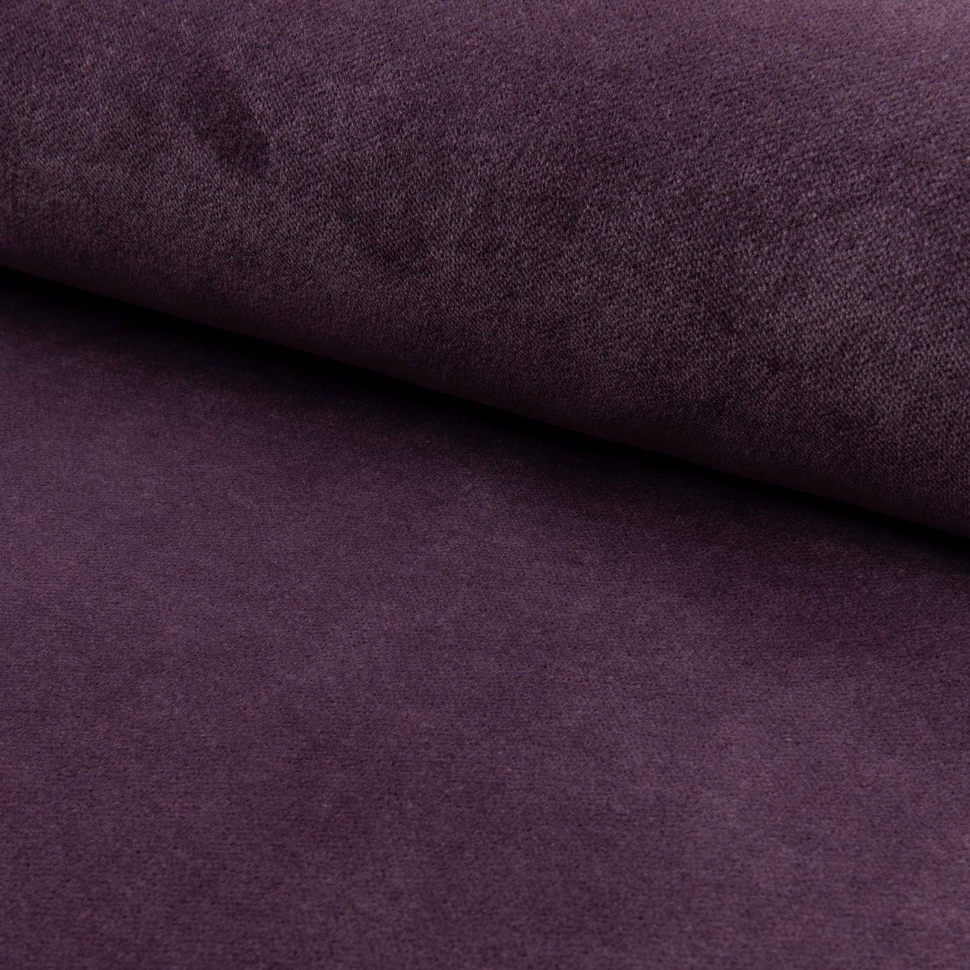 Purple velveteen upholstery fabric by the yard, rolled bolt view