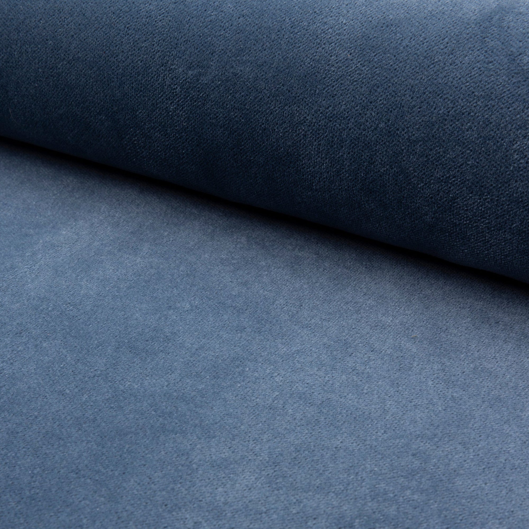Blue velveteen upholstery fabric by the yard, rolled bolt view