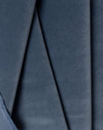 Blue velveteen upholstery fabric by the yard, folded showing drape and weight