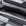 Black and gray abstract jacquard upholstery fabric by the yard, rolled bolt view
