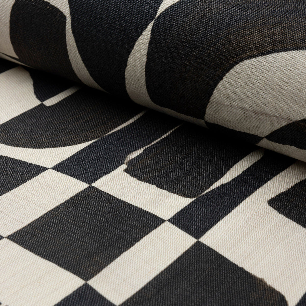 Black and cream abstract printed linen fabric by the yard, rolled bolt view