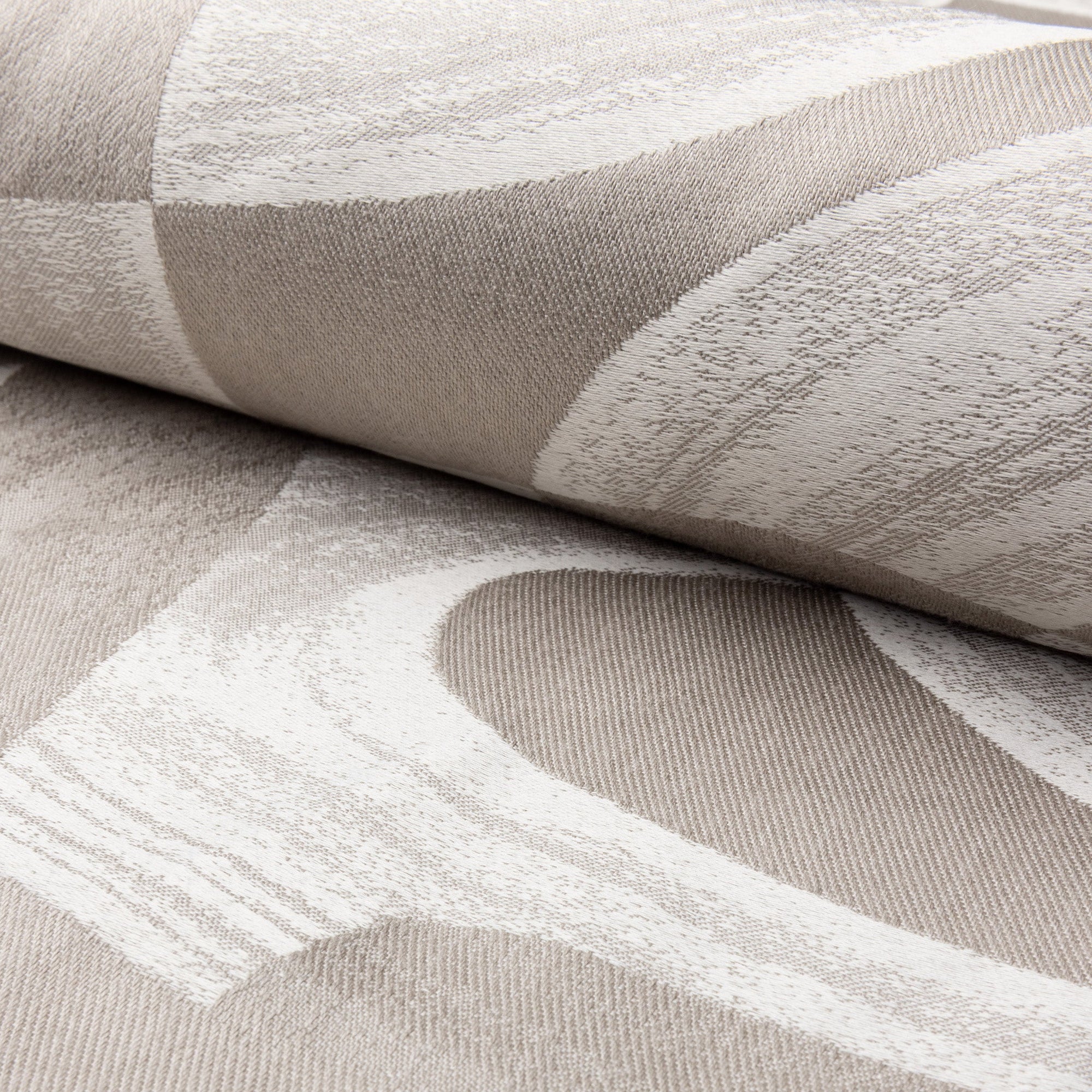 Beige abstract jacquard upholstery fabric by the yard, rolled bolt view