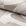 Beige abstract jacquard upholstery fabric by the yard, rolled bolt view