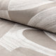 Beige abstract jacquard upholstery fabric by the yard, rolled bolt view