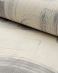 Gray and cream abstract printed linen fabric by the yard, rolled bolt view