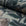 Dusky blue and coral floral printed linen fabric by the yard, rolled bolt view