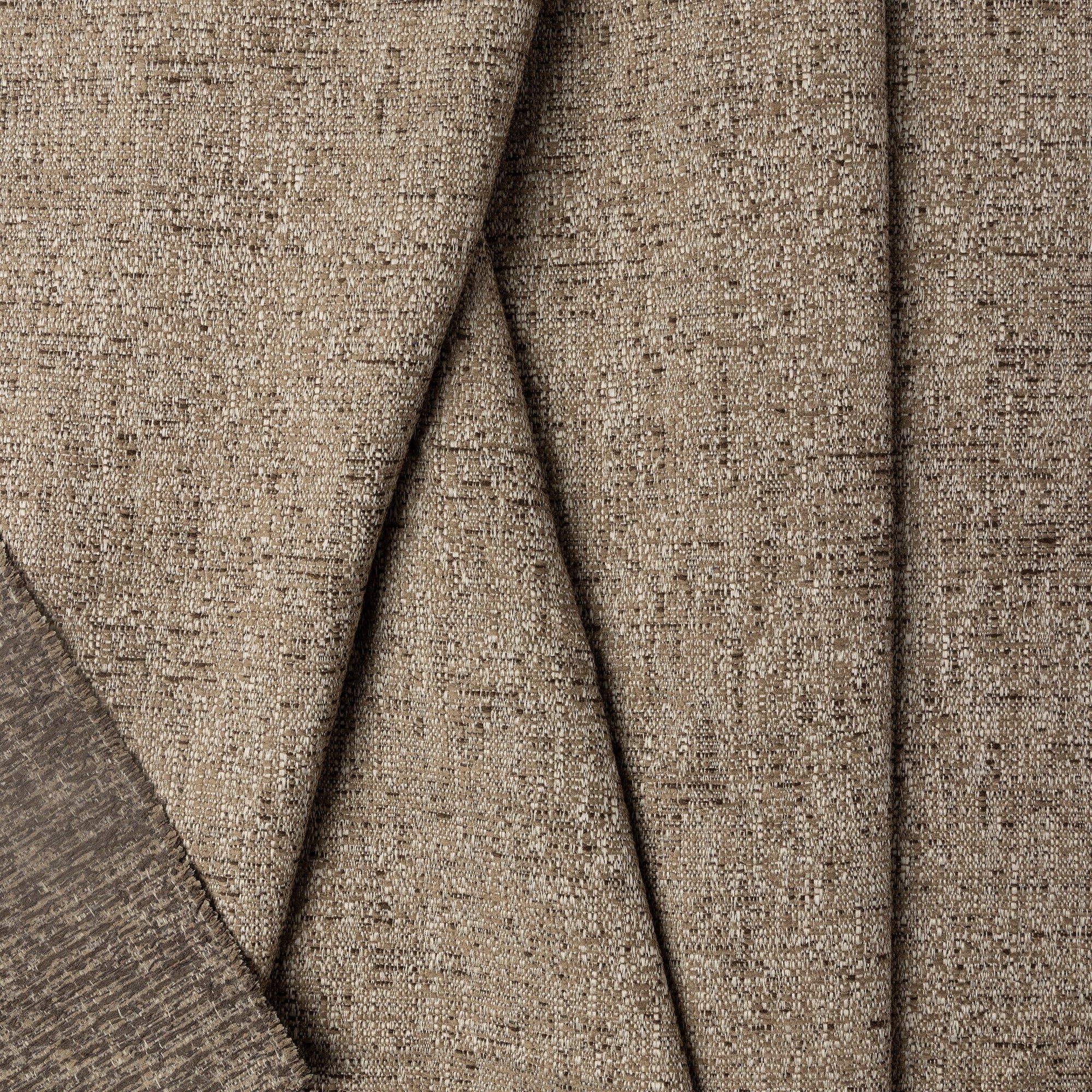 Brown marled chenille outdoor fabric by the yard, folded showing drape and weight