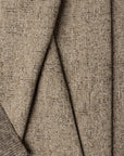 Brown marled chenille outdoor fabric by the yard, folded showing drape and weight