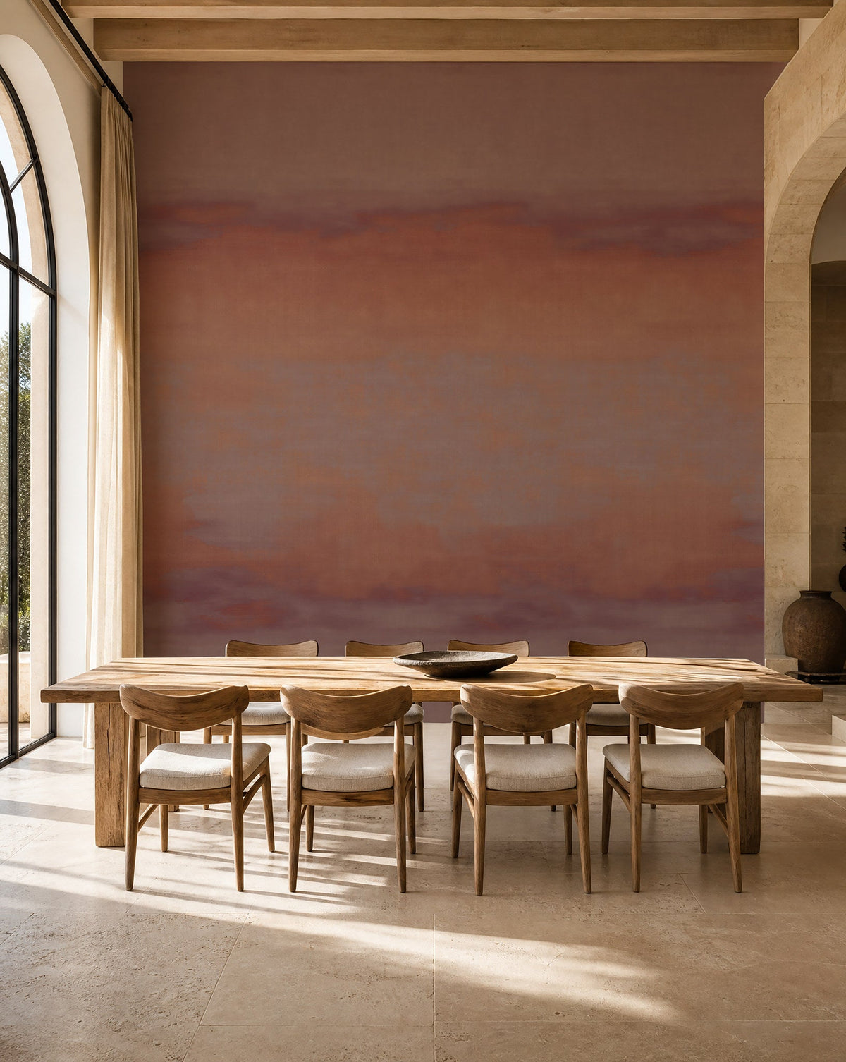 Rose and plum sunset ombre mural commercial wallcovering installed in a sunlit dining room