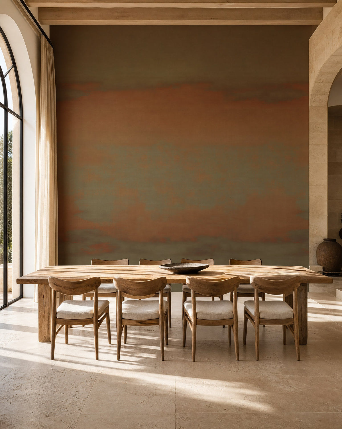 Copper and olive sunset ombre mural wallpaper installed in a sunlit dining room
