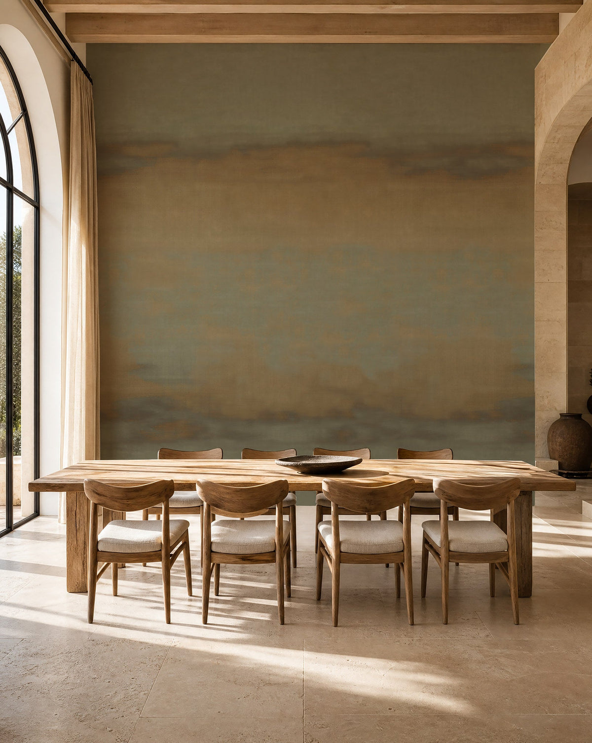 Khaki and gray-blue ombre mural wallpaper installed in a sunlit dining room