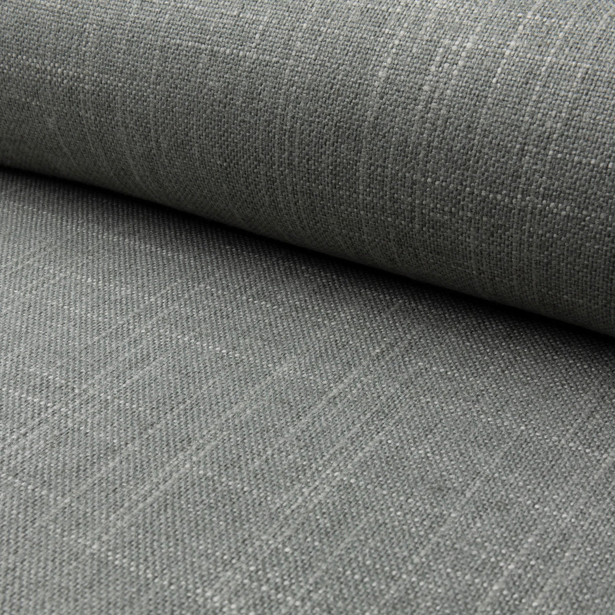 Green linen upholstery fabric by the yard, rolled bolt view