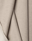 Gray linen upholstery fabric by the yard, folded showing drape and weight
