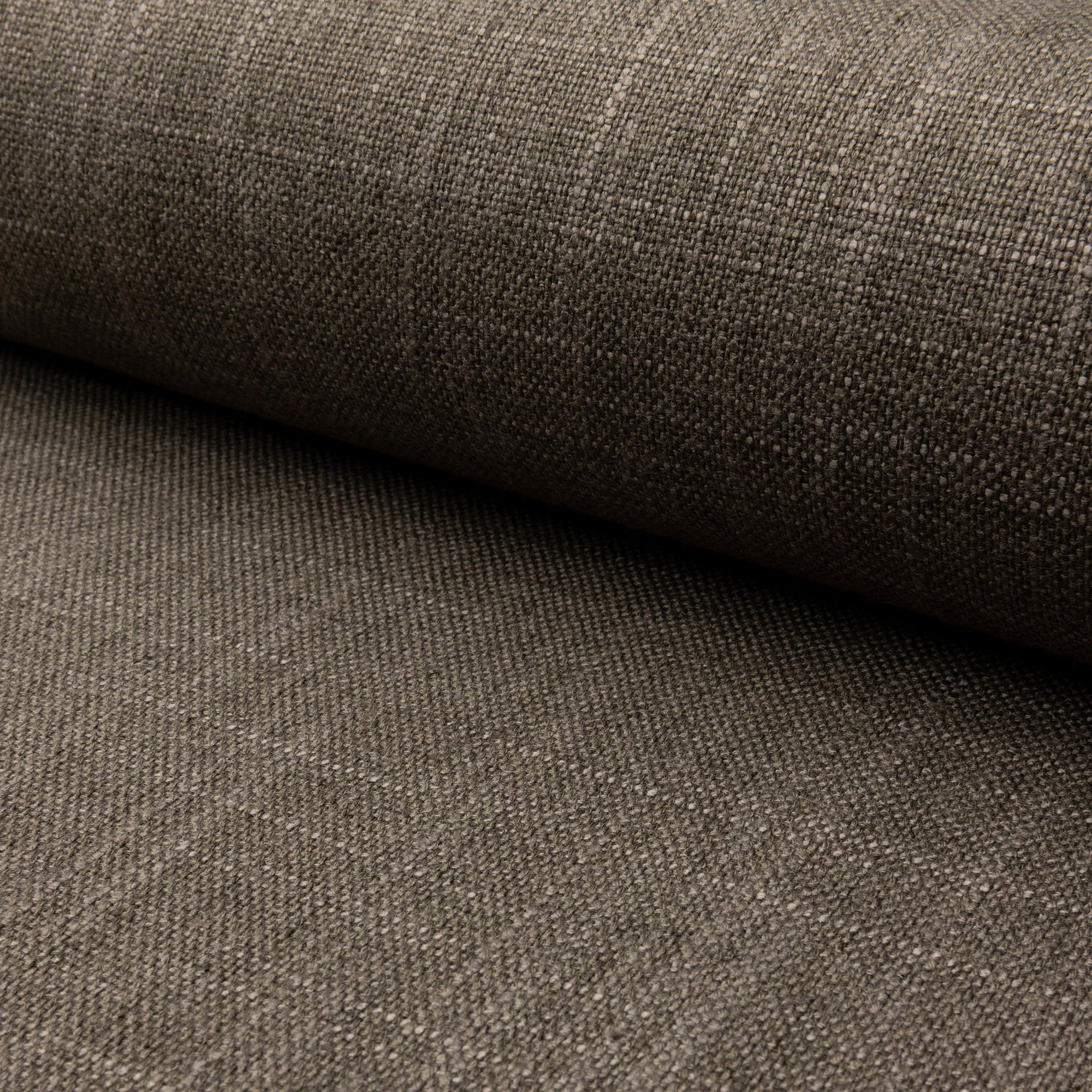 Green linen upholstery fabric by the yard, rolled bolt view