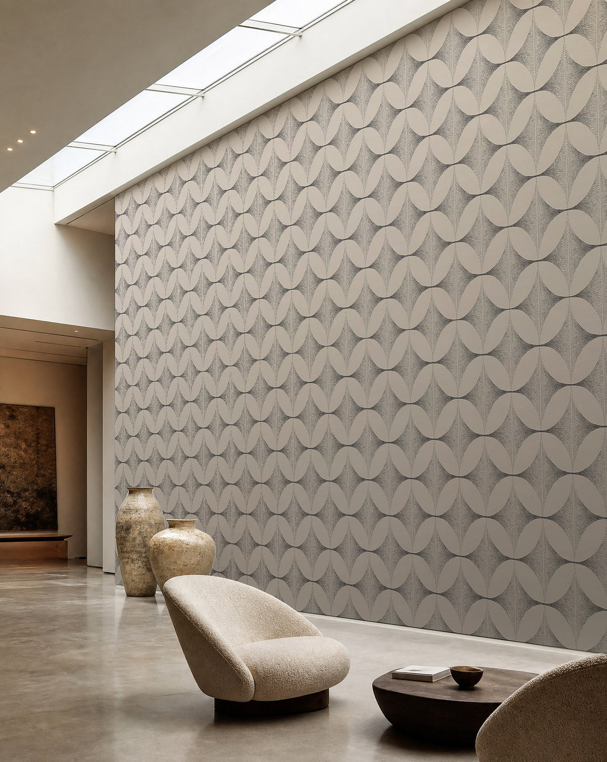 Off-white and black stippled petal geometric commercial wallcovering installed in a skylit lounge