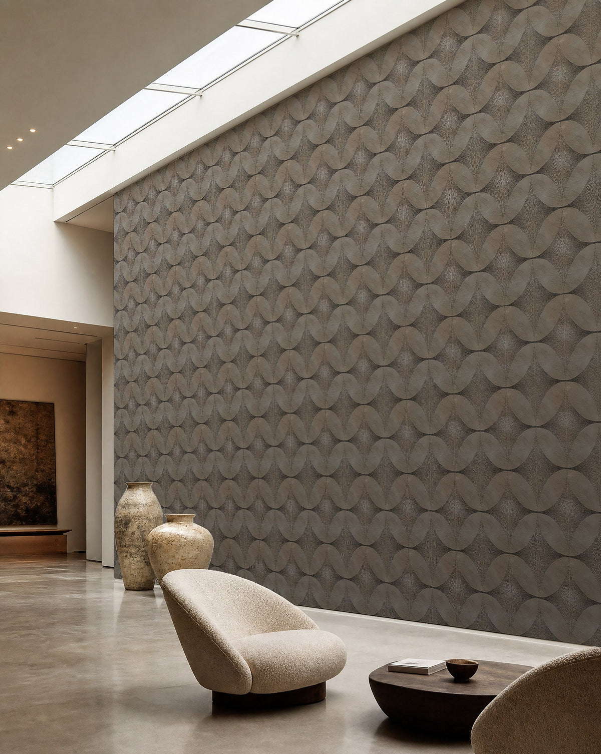 Taupe stippled petal geometric wallpaper installed in a skylit lounge
