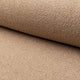 Beige boucle upholstery fabric by the yard, rolled bolt view
