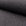Black boucle upholstery fabric by the yard, rolled bolt view