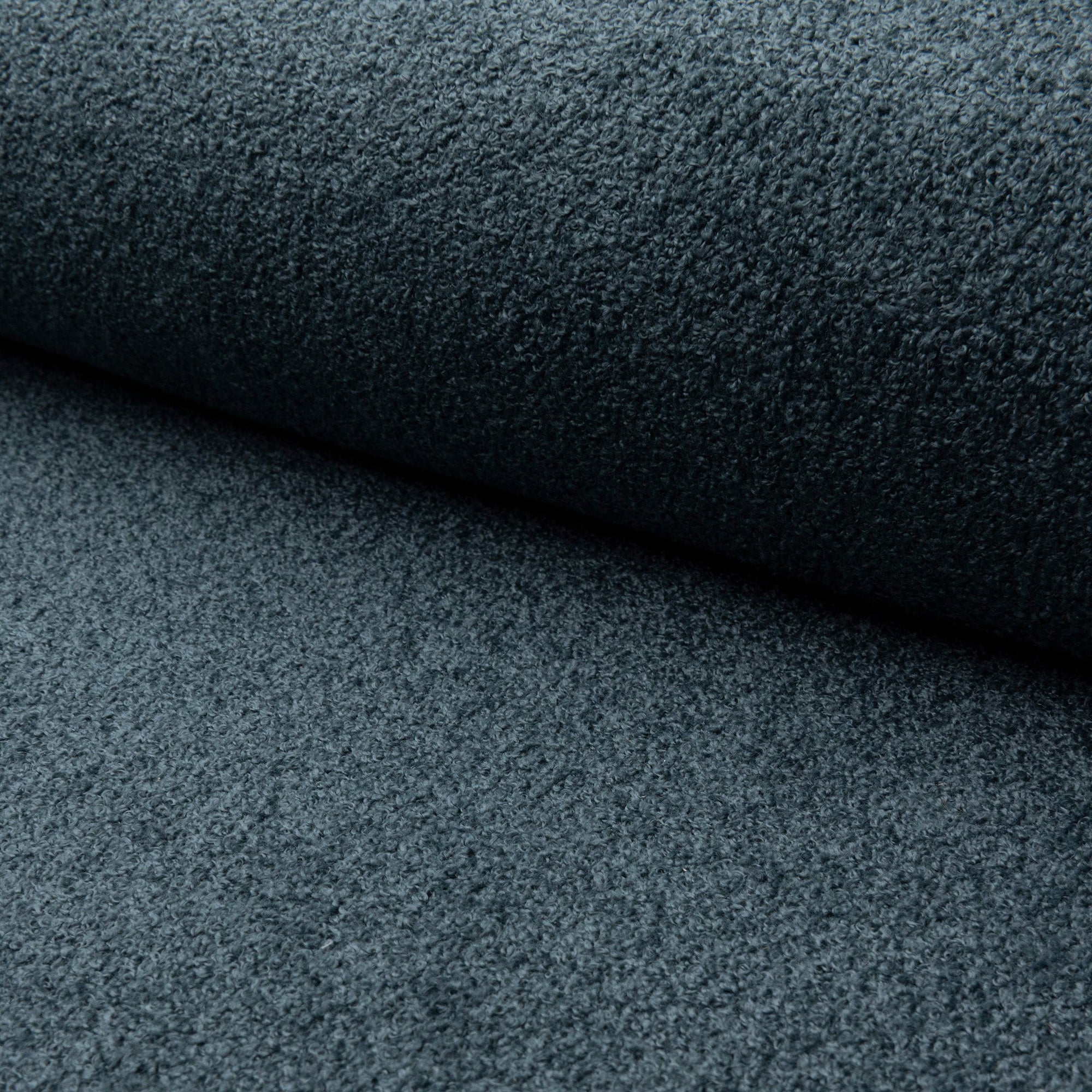 Blue boucle upholstery fabric by the yard, rolled bolt view