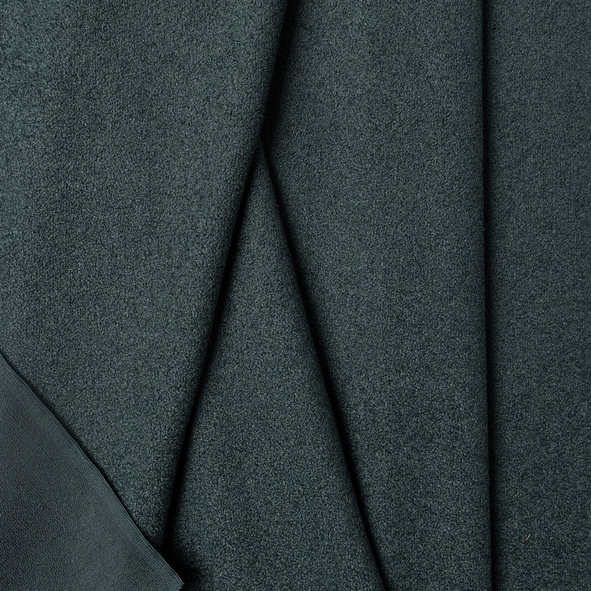 Blue boucle upholstery fabric by the yard, folded showing drape and weight