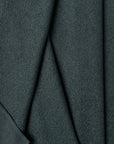 Blue boucle upholstery fabric by the yard, folded showing drape and weight