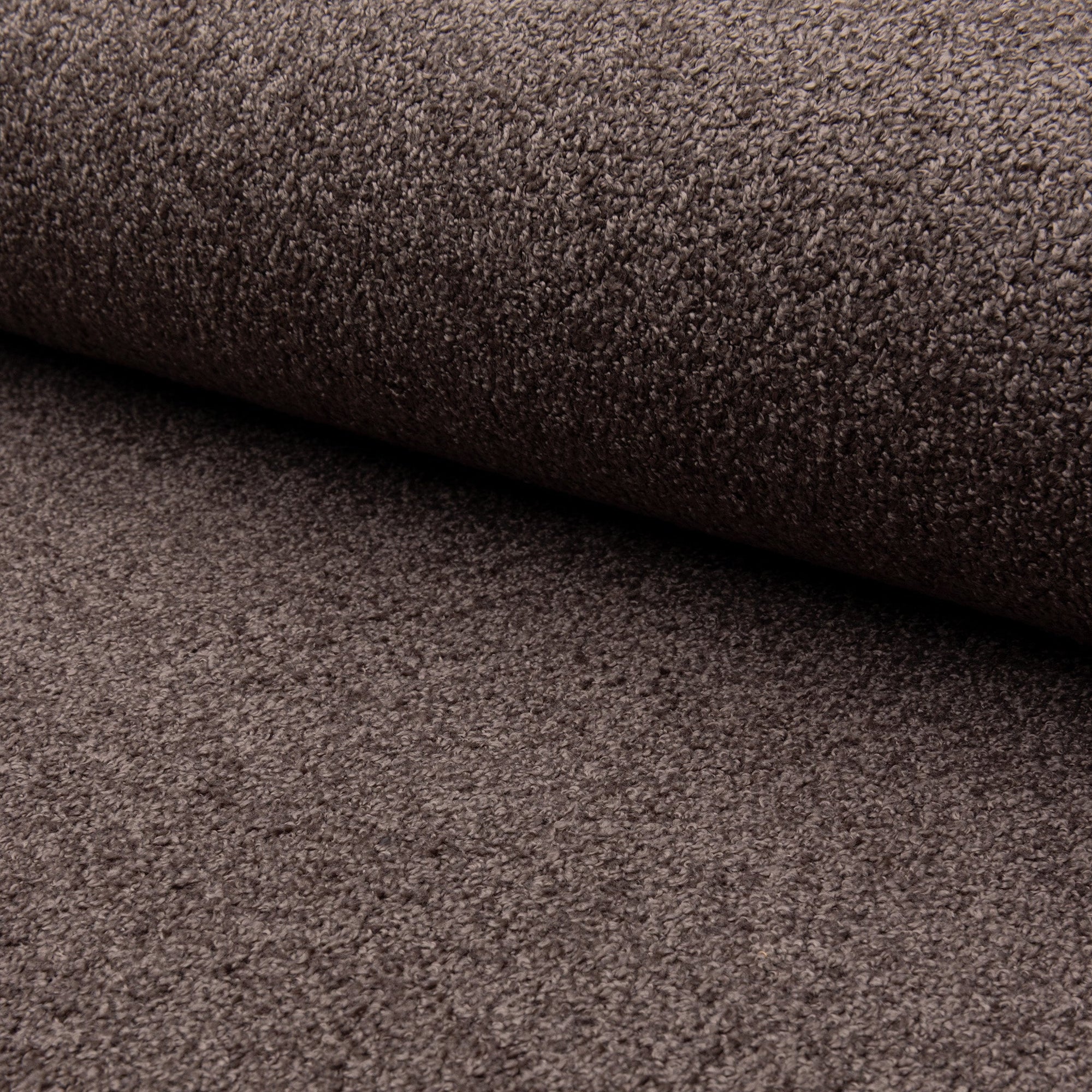 Brown boucle upholstery fabric by the yard, rolled bolt view