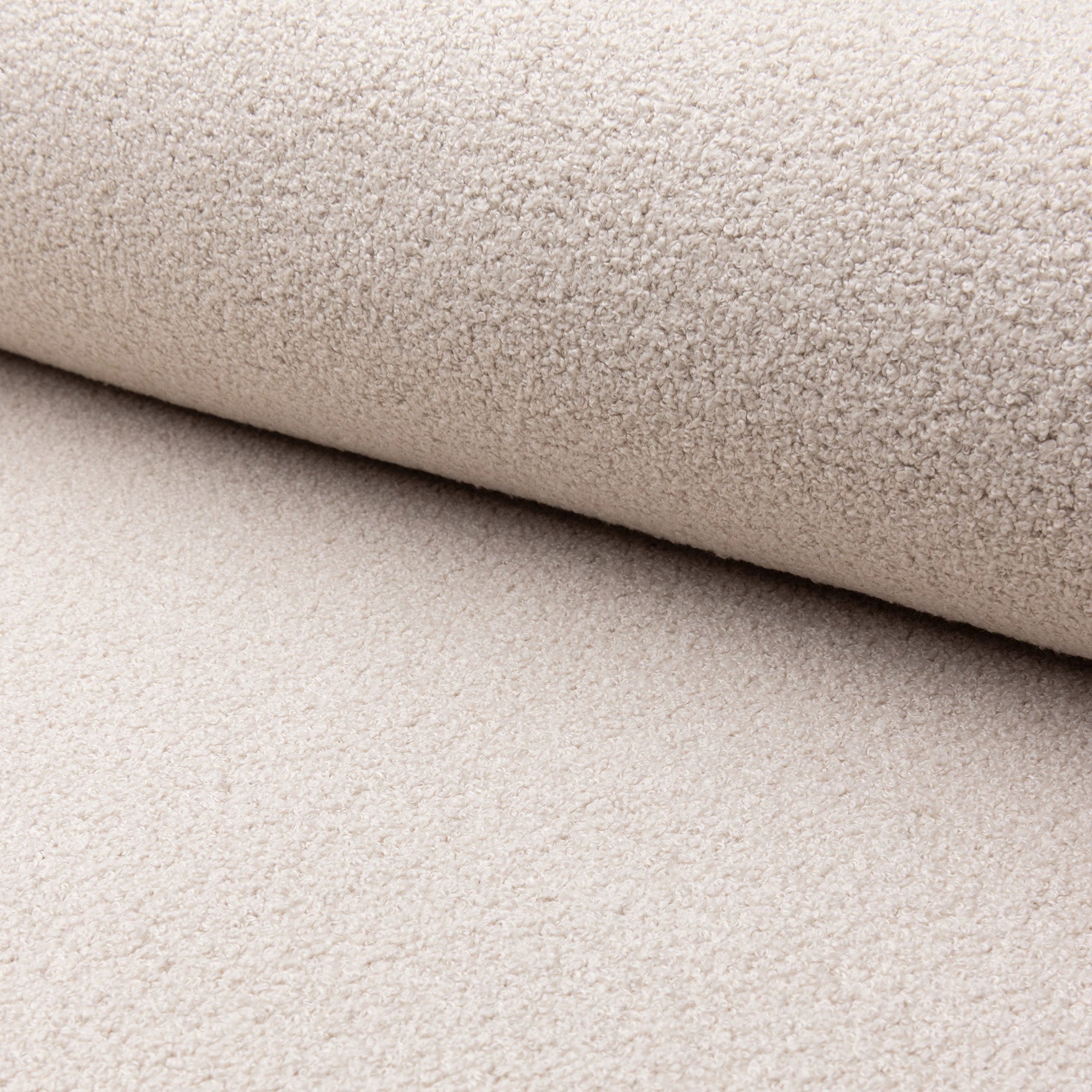 Cream boucle upholstery fabric by the yard, rolled bolt view