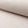 Cream boucle upholstery fabric by the yard, rolled bolt view