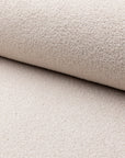 Cream boucle upholstery fabric by the yard, rolled bolt view