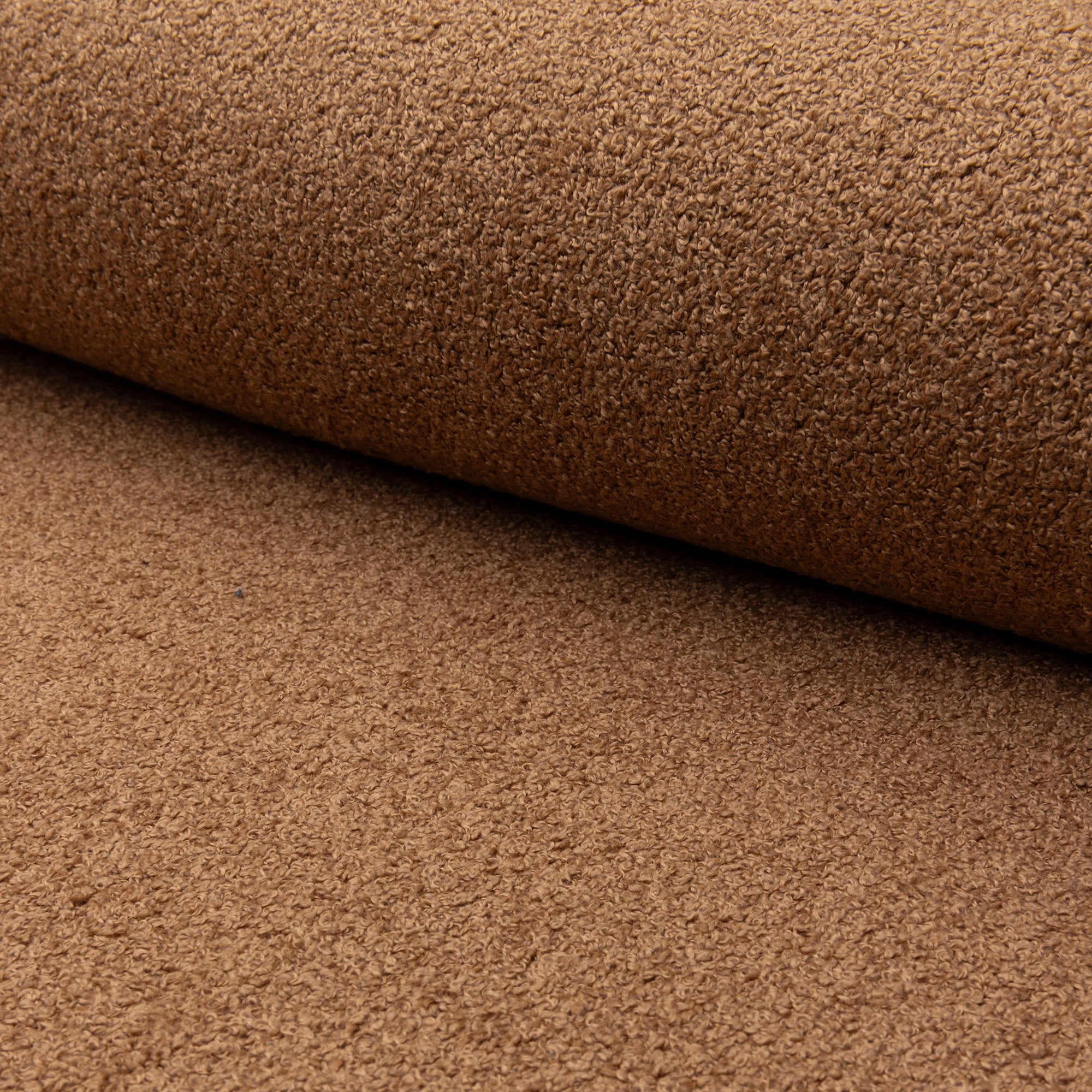 Brown boucle upholstery fabric by the yard, rolled bolt view