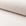 White boucle upholstery fabric by the yard, rolled bolt view