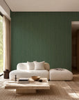 Green and gold hand-drawn line wallpaper installed in a living room