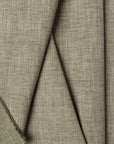 Green basketweave upholstery fabric by the yard, folded showing drape and weight