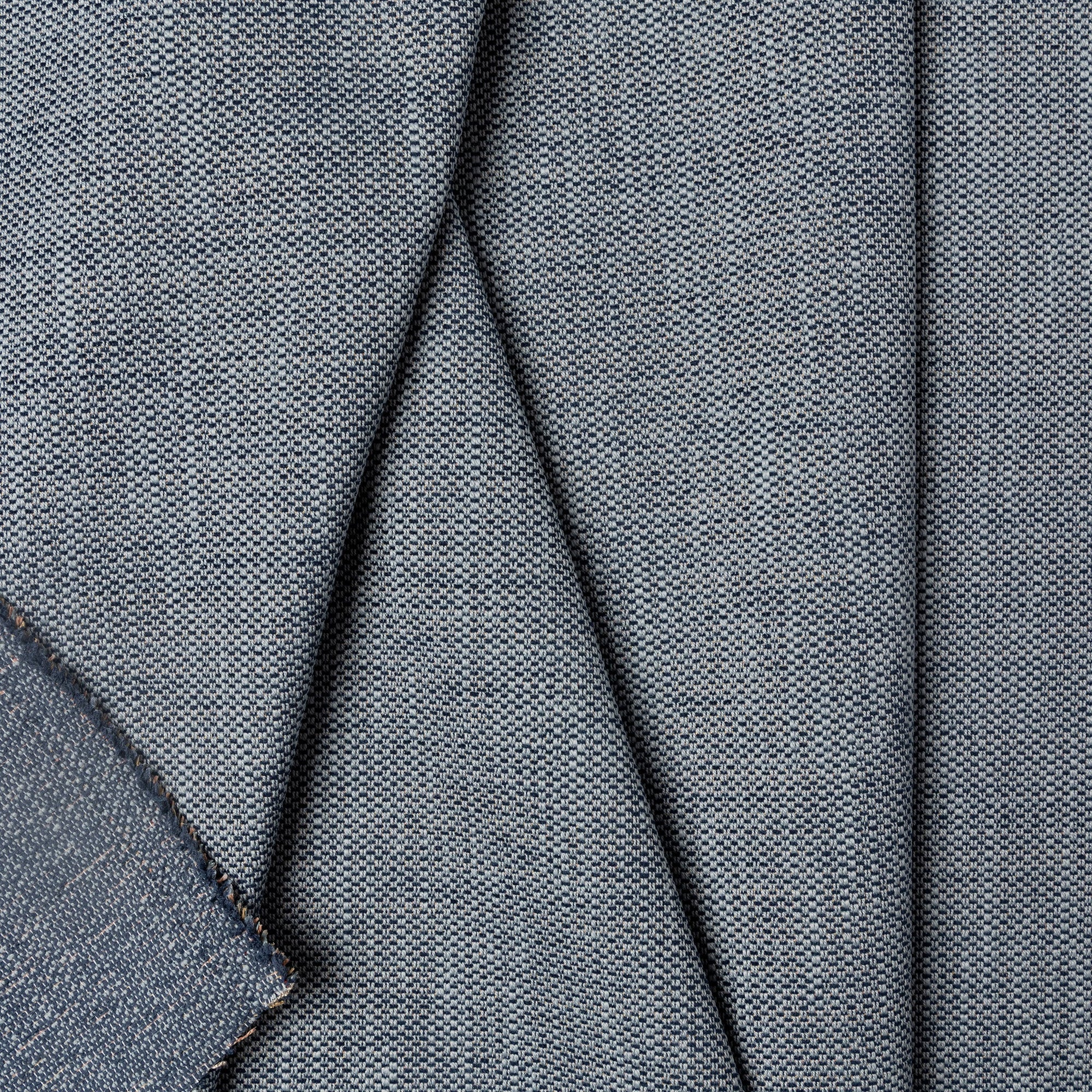 Blue basketweave upholstery fabric by the yard, folded showing drape and weight